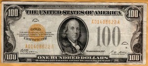 $100 Series 1928 Gold Certificate, in high grade, discoloration on back