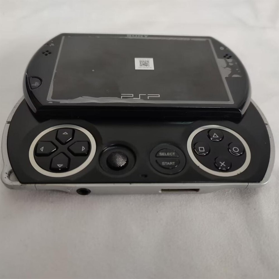 Sony PSP GO console Black with Charger PSPN1001 Music button