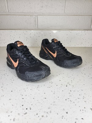 black and rose gold nikes