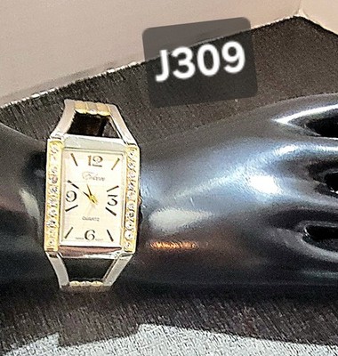 Eikon Women's Silver Toned Cuff Band Analog Watch Quartz- New Battery J309
