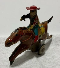 Vintage 1950’s ~ LineMar ~ Japan ~ Tin Lithograph Friction Toy ~ Cowboy & Horse