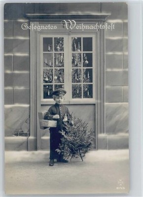12015619 - Series 814-6 Child as Servant, with a Christmas Tree and Packages