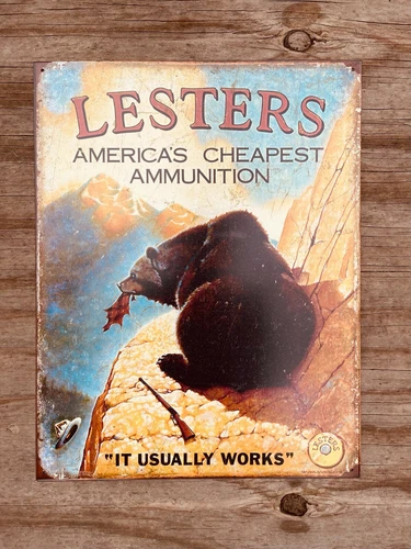 Lester's Ammo America's Cheapest Ammo HOME / GARAGE TIN SIGN Vintage 12.5x16"