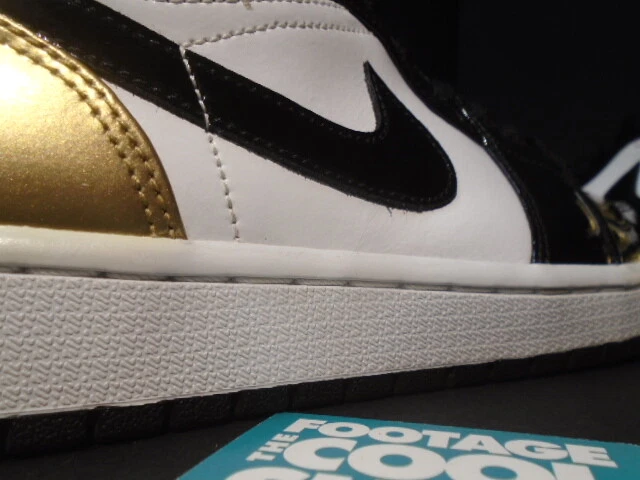 Jordan 1 low top gold toe on feet