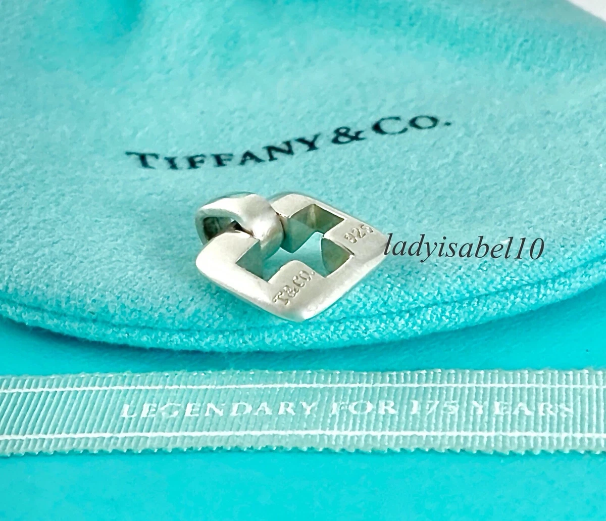 Tiffany small 2024 cross necklace