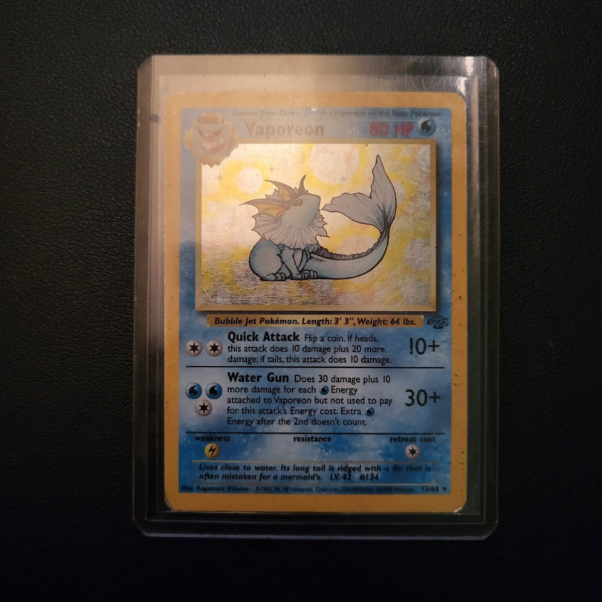 英語版初期　ポケモンカード　Vaporeon holo 1st Edition Vaporeon Holo Rare Vintage Pokemon Card Jungle Set 12/64