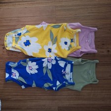 Carter  s Set Of 4 One-pieces. SIZE 0-3. NWOT