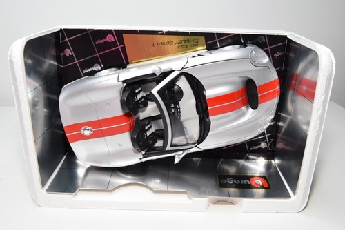 B39 1:18 BBURAGO BURAGO 3323 SHELBY SERIE 1 1998 GRIS METÁLICO NUEVO EN CAJA - Imagen 12 de 21