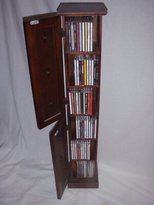CD's...60 (sixty)....plus the cabinet....USED....rock & roll hits....Atlanta, Ga