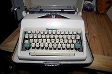 Vintage Olympia DeLuxe Portable Typewriter & Case Germany  thumbnail