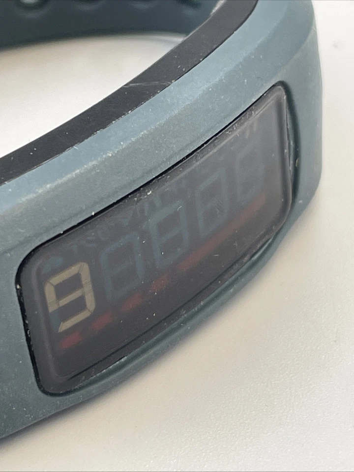 Garmin Vivofit Aktivitätstracker - Schwarz mit grauem Band (lesen) - Bild 4 von 4