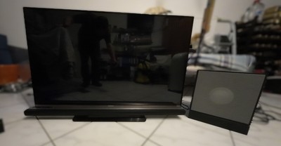 Phillips Fernseher mit Ambillight, Soundbar und Wandhalterung