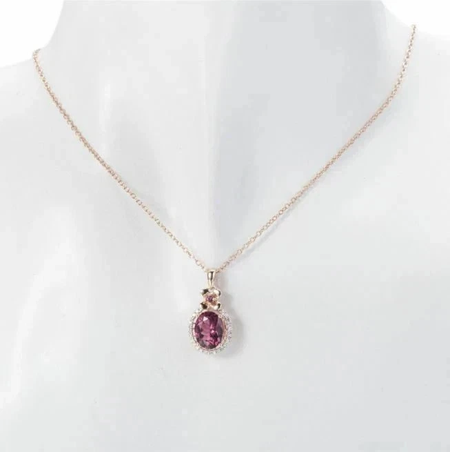 Colgante para mujer de turmalina rosa simulada de corte ovalado de 3 quilates enchapado en oro amarillo de 14 quilates Foto 2 de 3