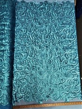 Matte Turquoise Curly Sequin Fabric on Poly Mesh "The Spiral Sequin" - BTY