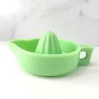 💠 McKee Jadeite Sunkist Orange Reamer — Light Green, Uranium Glow
