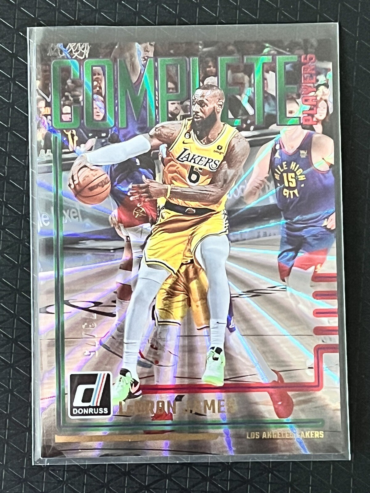 2023-24 Donruss LeBron James #73/75 'Complete Players' Red/Green Laser Holo SP
