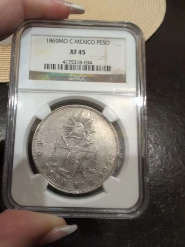 1869 Mo C Mexico Peso NGC XF45 Silver “Balance Scale” Peso Scarce Early Issue