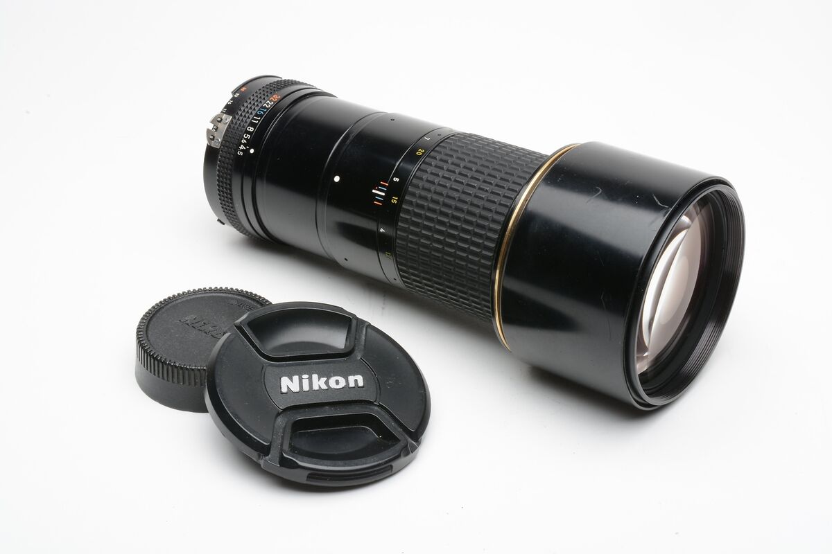 Nikon Nikkor 300mm f4.5 ED IF AIS telephoto lens, caps Nikon Nikkor 300mm f4.5 ED IF AIS telephoto lens, caps