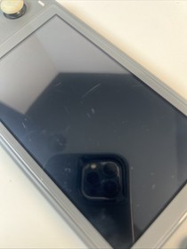 Nintendo Switch Lite 32GB Gray charger 2 Games - Tested