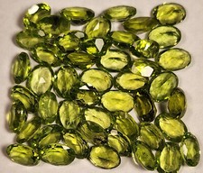 PERIDOT. 7 x 5 mm Ovals Very nice stones. Clean and well cut.