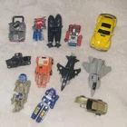 1983-1984 GoBots lot (10)- Leader 1, Spoons Forklift, Cykill, Submarine & more