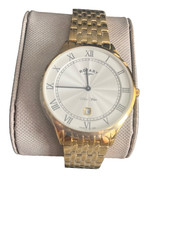 Image of rotary ultra slim mens watch brand new in a gold colour with box.