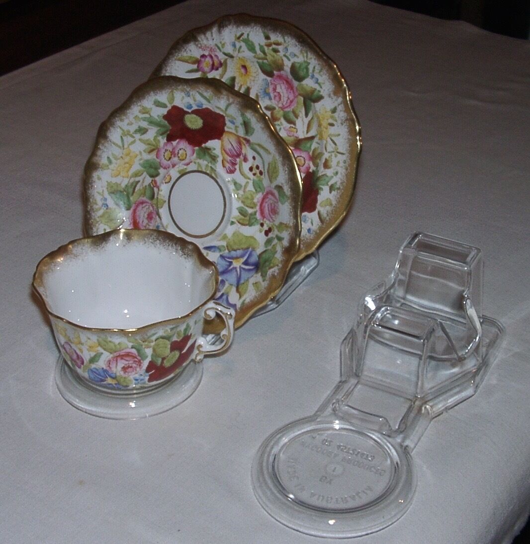 36  CUP, SAUCER AND PLATE STANDS - CLEAR