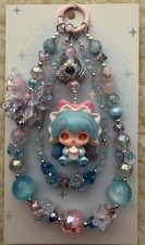 Handmade Bag/Phone Charm with Colorful Beads and authentic figure