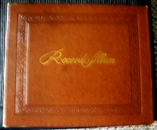 VINTAGE DECCA BROWN STORAGE BOOK FOR 45s WITH 24 45s INCLUDED