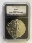 1987 SILVER EAGLE $1 NGC MS69 25TH ANNIV LABEL