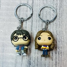 EXCLUSIVO DE VACACIONES Harry Potter y Hermione Pocket Pop Lote de 2 Llaveros Clip Bolsa