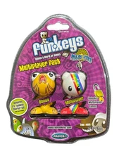 Funkey  Lucky (rainbow with red arms and feet) and Gulp (orange)