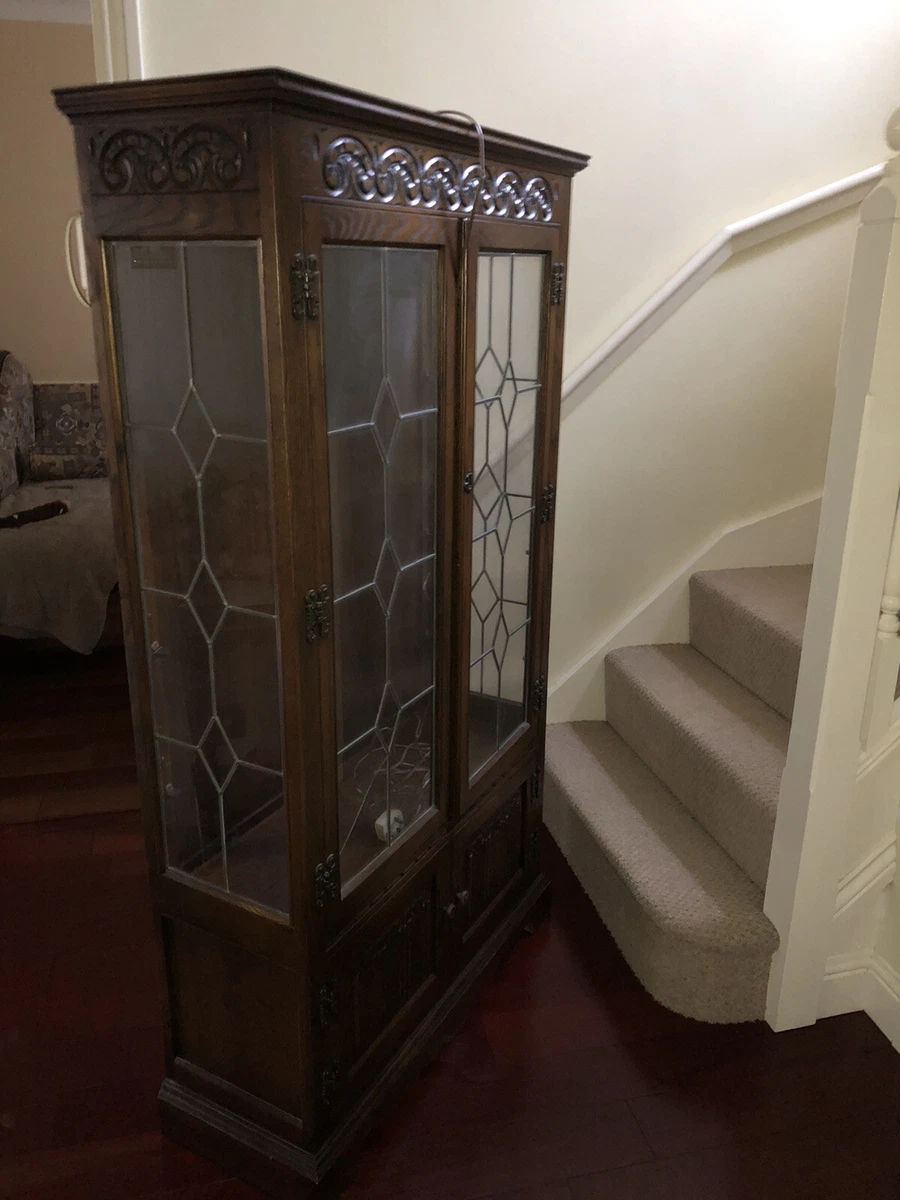 Antique curio cabinet on sale with leaded glass