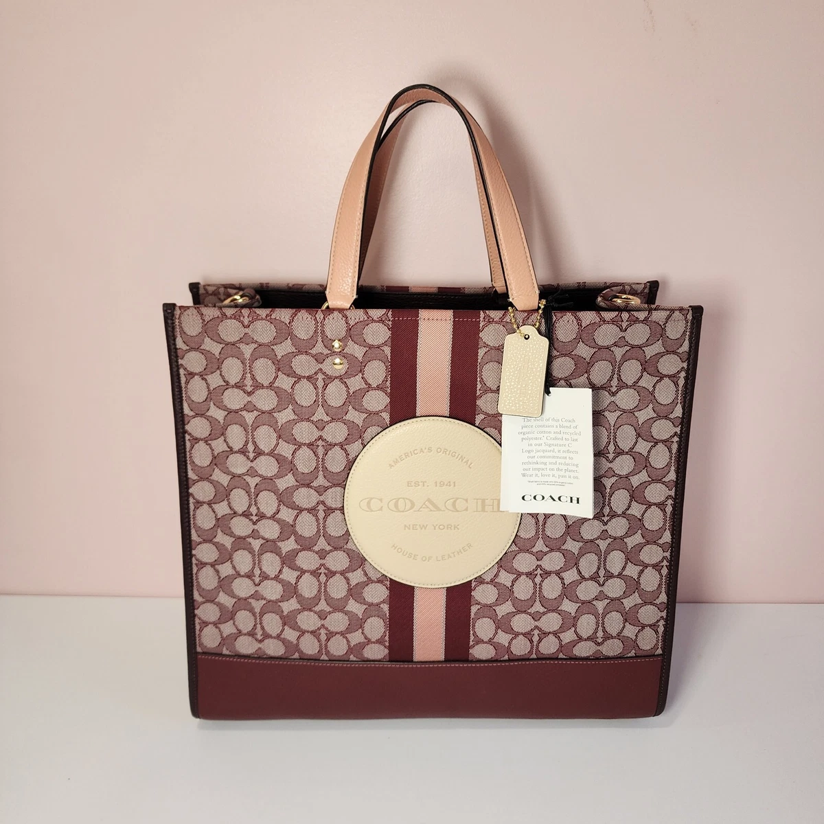 Coach zip top 2025 tote in signature jacquard