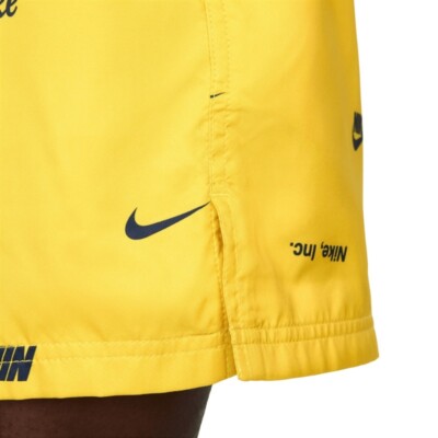 nike club woven shorts in yellow
