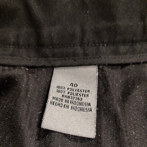 Pantalones cortos de golf para hombre America Perry Ellis plisados 100 % poliéster negros 40 Indonesia - Imagen 3 de 11