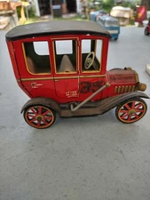 Lever action model t tin toy truck