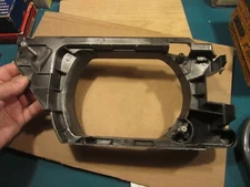 GM 16506089 headlight bracket L.H.