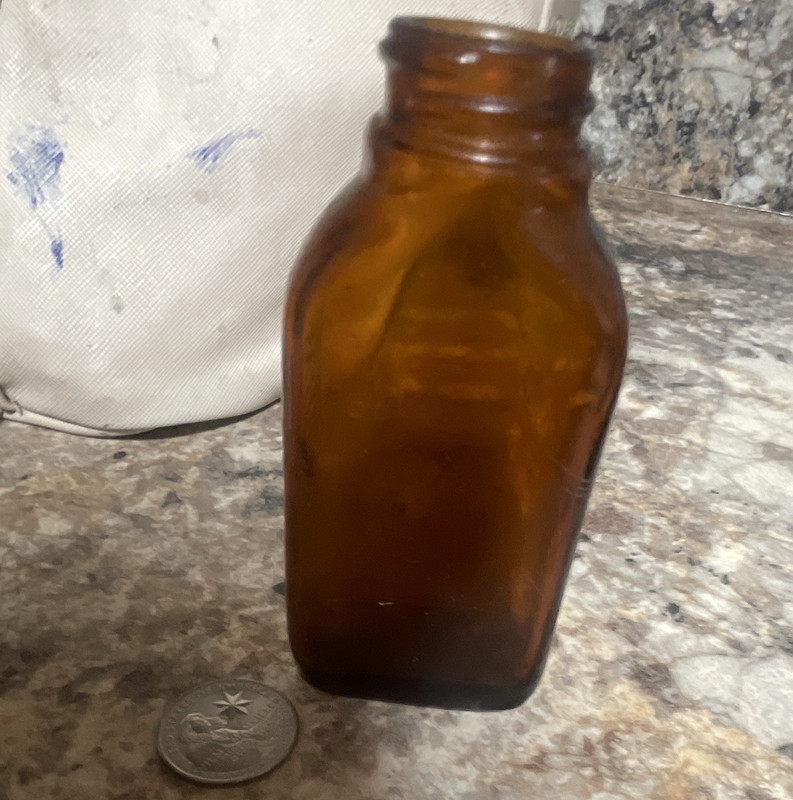 Brown Amber Glass Medicine Bottle Bottle with Embossed Markings Glass whitetail