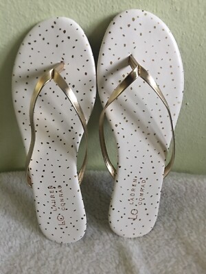 flip flops gold and white