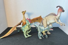 Lot of 4 vintage Hasbro Jurassic Park III JP3 dinosaur action figures.