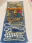 Lot of Vintage Costume Jewelry 9 necklaces 27 sets of earrings. Clasps work.