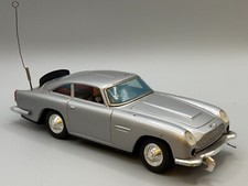 Vintage James Bond Aston Martin DB5 Battery operated tin toy Gilbert 1965