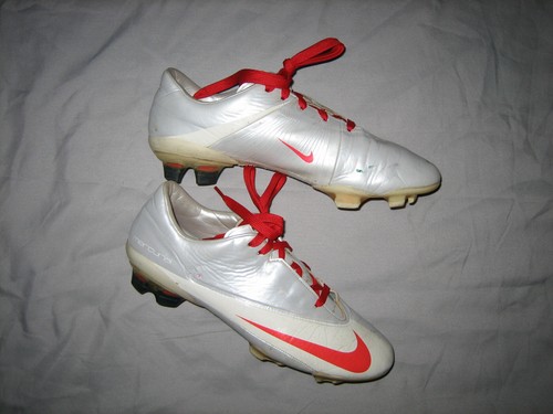silver nike boots