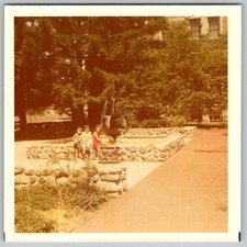 Vtg Color Snapshot Children Play Garden Fountain Brick Path Trees Outdoor 1970s