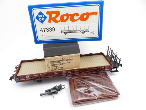 360H0 /2 - Roco H0 47388 - Rungenwagen braun DR mit Holzkiste - top in OVP | Zustand: Gebraucht