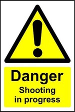 Warning signs Danger Shooting in progress safety sign 