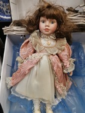 Vintage, 15" P9939C Porcelain Girl with bonnet Doll. 