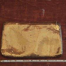 vintage Whiting Davis gold tone metal mesh clutch handbag.