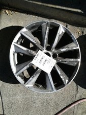 ALL WHEELS HAVE SCRATCHES AND CURB RASHES.SEE PHOTOS